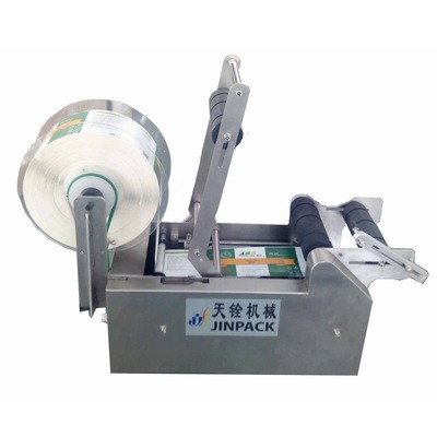 半自動手壓式圓瓶貼標機，半自動貼標，手動貼標機