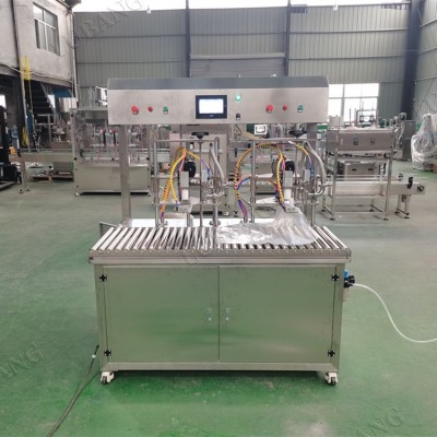 雙頭盒中袋液體灌裝壓蓋一體機軟袋鋁箔袋灌裝機純凈水飲料灌裝機